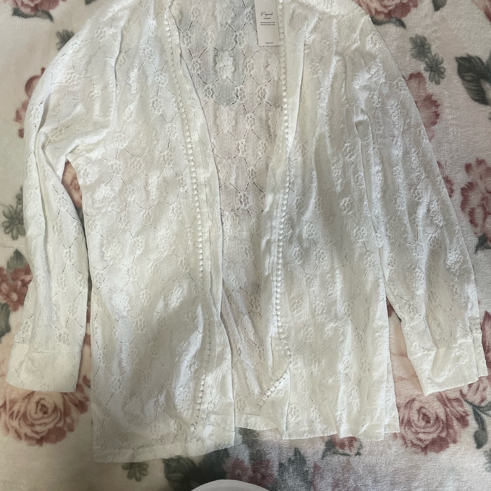 Chic White Lace Cardigan by [Brand]